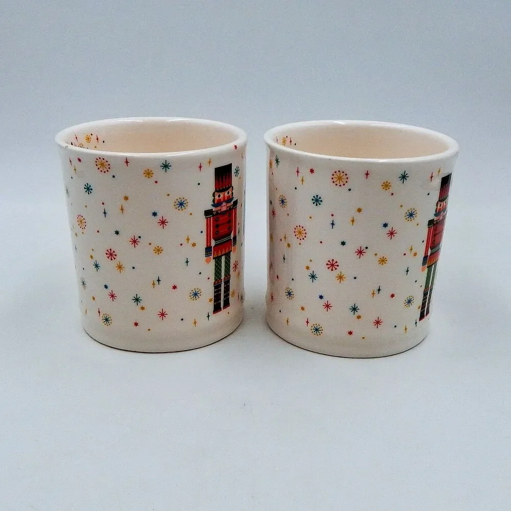SUR LA TABLE Nutcracker Snowflake Coffee Mug Christmas Hot Chocolate 17.8 oz S/2